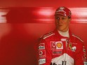 Ferrari's Michael Schumacher in the garage before the Australian Formula One Grand Prix on March 9, 2003