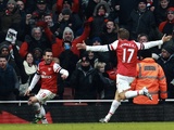 Arsenal's Santi Cazorla celebrates his second goal against Aston Villa with Nacho Monreal on February 23, 2013