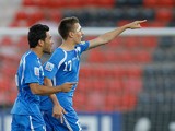 Uzbekistan's Igor Sergeev celebrates after scoring his team's second against Greece during the U20 World Cup on July 2, 2013