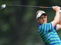 Luke Donald of England hits a shot during a practice round prior to the start of the 95th PGA Championship at Oak Hill Country Club on August 7, 2013