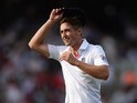 Chris Woakes of England grimaces in the field during day one of the 5th Investec Ashes Test match between England and Australia at the Kia Oval on August 21, 2013