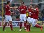 Forest's Andy Reid is congratulated by team mates after scoring the opening goal against Watford on August 25, 2013