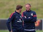 England's Wayne Rooney and Steven Gerrard chat during a training session at St Georges Park on August 12, 2013