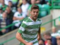 Charlie Mulgrew of Celtic in action during the Scottish Premier League game between Celtic and Ross County at Celtic Park Stadium on August 03, 2013