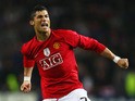Cristiano Ronaldo of Manchester United celebrates victory after the UEFA Champions League Quarter Final second leg match between FC Porto and Manchester United at the Estadio do Dragao on April 15, 2009