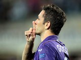 Fiorentina's Gonzalo Rodriguez celebrates after scoring the opening goal against Pacos de Ferreira during their Europa League group match on September 19, 2013
