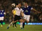 Everton's Darren Gibson and Fulham's Scott Parker battle for the ball during their League Cup match on September 24, 2013