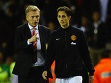 David Moyes of Manchester United talks with Adnan Januzaj after victory in the Barclays Premier League match between Sunderland and Manchester United at Stadium of Light on October 5, 2013
