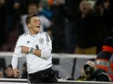 Germany's midfielder Mesut Ozil celebrates scoring his side's 3rd goal during the FIFA 2014 World Cup Group C qualifying football match Germany vs Republic of Ireland in Cologne, western Germany on October 11, 2013