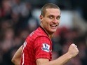 Nemanja Vidic of Manchester United celebrates scoring the second goal during the Barclays Premier League match against Liverpool on January 13, 2013