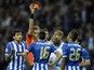 Italian referee Paolo Tagliavento shows the red card to Porto's Mexican midfielder Hector Herrera during the UEFA Champions League Group G football match FC Porto vs Zenit at the Dragao Stadium in Porto on October 22, 2013