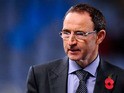 New Ireland Manager Martin O'Neill looks on prior to the UEFA Champions League Group A match between Real Sociedad de Futbol and Manchester United at Estadio Anoeta on November 5, 2013