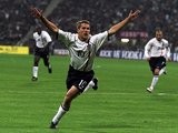 Michael Owen celebrates one of his three goals against Germany on September 08, 2001.