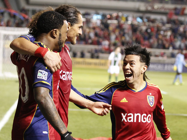 Robbie Findley #10, Devon Sandoval #49 and Sebastian Velasquez #26 of Real Salt Lake celebrate a goal during a game against the Portland Timbers during the first half of the Western Conference Championship MLS soccer game - leg 1, on November 10, 2013