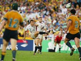England's Jonny Wilkinson kicks the winning drop goal against Australia during the final of the World Cup on November 22, 2003