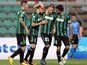 Sassuolo's Domenico Berardi is congratulated by teammates after scoring his team's second goal against Atalanta on November 24, 2013