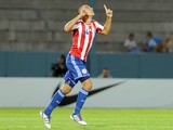 Paraguay's national U-17 football team player Antonio Sanabria celebrates after scoring against Argentina during their U-17 South American football tournament group A match in Ciudad de la Punta, province of San Luis, Argentina, on April 4, 2013