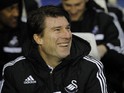 Swansea City's Danish manager Michael Laudrup gestures during the English FA Cup fourth round football match between Birmingham City and Swansea City at St Andrew's stadium in Birmingham on January 25, 2014