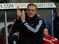 Swansea's new head coach Garry Monk greets fans ahead of the match against Cardiff during their Premier League match on February 8, 2014