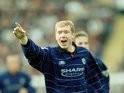 Paul Scholes celebrates scoring for Manchester United against Bradford City on March 25, 2000.
