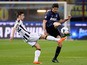Andrea Ranocchia of FC Inter Milan and Bruno Fernandes of Udinese Calcio (L) compete for the ball during the Serie A match on March 27, 2014