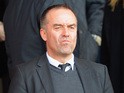 Norwich director David McNally looks on during the Barclays Premier League match between Southampton and Norwich City at St Mary's Stadium on March 15, 2014