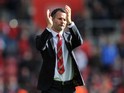 Manchester United's Interim manager Ryan Giggs thanks the fans after the English Premier League football match between Southampton and Manchester United at St Mary's stadium in in Southampton on May 11, 2014
