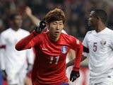 Son Heung-Min celebrates scoring for South Korea on March 26, 2013.