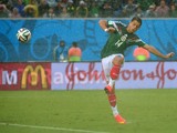 Mexico's forward Javier Hernandez kicks the ball during the Group A football match between Mexico and Cameroon at the Dunas Arena in Natal during the 2014 FIFA World Cup on June 13, 2014