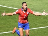 Chile's forward Alexis Sanchez celebrates after scoring a goal during the Round of 16 football match between Brazil and Chile at The Mineirao Stadium on June 28, 2014