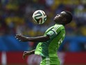 Nigeria's forward Emmanuel Emenike plays the ball during a Round of 16 football match between France and Nigeria at Mane Garrincha National Stadium in Brasilia during the 2014 FIFA World Cup on June 30, 2014