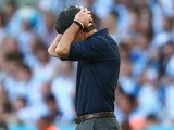 Head coach Joachim Loew of Germany reacts during the 2014 FIFA World Cup Brazil Final match between Germany and Argentina at Maracana on July 13, 2014 