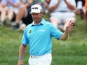 Lee Westwood of England waves during the first round of the 96th PGA Championship at Valhalla Golf Club on August 7, 2014