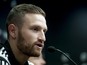 Valencia's new German defender Shkodran Mustafi gives a press conference during his official presentation in Valencia on August 7, 2014