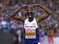 Great Britain's Mohamed Farah celebrates after winning the Men's 5000m final during the European Athletics Championships at the Letzigrund stadium in Zurich on August 17, 2014