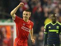 Jordan Rossiter of Liverpool celebrates after scoring the opening goal during the Capital One Cup Third Round match against Middlesbrough on September 23, 2014