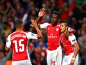 Danny Welbeck of Arsenal celebrates with team-mates Alex Oxlade-Chamberlain and Alexis Sanchez after scoring the opening goal during the UEFA Champions League group D match between Arsenal FC and Galatasaray AS at Emirates Stadium on October 1, 2014