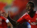Benfica's Brazilian midfielder Anderson Talisca celebrates after scoring a goal during the UEFA Champions League group C football match SL Benfica vs AS Monaco at Luz stadium in Lisbon on November 4, 2014