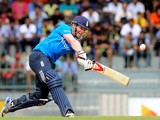 :England cricketer Eoin Morgan plays a shot during the fourth One Day International (ODI) match between Sri Lanka and England at the R. Premadasa Cricket Stadium in Colombo on December 7, 2014