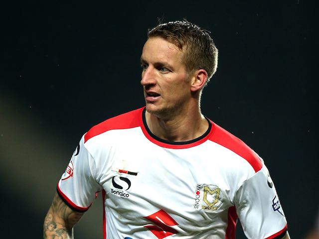 Carl Baker of MK Dons in action during the Sky Bet League One match against Rochdale at Stadium mk on November 25, 2014