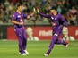 Cameron Boyce of the Hurricanes celebrates after taking the wicket of David Hussey of the Stars during the Big Bash League match between the Melbourne Stars and the Hobart Hurricanes at Melbourne Cricket Ground on December 20, 2014