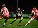Saracens player Alex Goode makes a break during the Aviva Premiership match between Gloucester Rugby and Saracens at Kingsholm Stadium on January 9, 2015