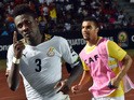 Ghana's forward Asamoah Gyan celebrates with teammate Kwesi Appiah after scoring a goal during the 2015 African Cup of Nations group C football match between Ghana and Algeria in Mongomo on January 23, 2015