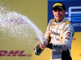 Jolyon Palmer of Great Britain and DAMS celebrates on the podium after victory in the Russian GP2 Series race held before the Russian Formula One Grand Prix on October 11, 2014
