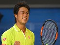 Kei Nishikori of Japan celebrates winning in his fourth round match against David Ferrer of Spain during day eight of the 2015 Australian Open at Melbourne Park on January 26, 2015