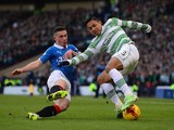 Fraser Aird of Rangers tackles Emilio Izaguirre of Celtic during the Scottish League Cup Semi-Final between Celtic and Rangers at Hampden Park on February 1, 2015 