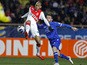 Monaco's Brazilian defender Fabinho vies for the ball with Bastia's French defender Julian Palmieri the French League Cup quarter-final football match between Monaco (ASM) and Bastia (SCB) on February 4, 2015