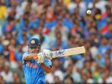 MS Dhoni of India edges the ball and is out caught behind during the 2015 ICC Cricket World Cup match between South Africa and India at Melbourne Cricket Ground on February 22, 2015