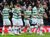 Kris Commons of Celtic celebrates scoring the opening goal with Leigh Griffiths and Emilio Izaguirre during the Scottish League Cup Final between Dundee United and Celtic at Hampden Park on March 15, 2015