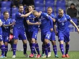Iceland's players celebrate after scoring a goal during the Euro 2016 qualifying football match between Kazakhstan and Iceland in Astana on March 28, 2015